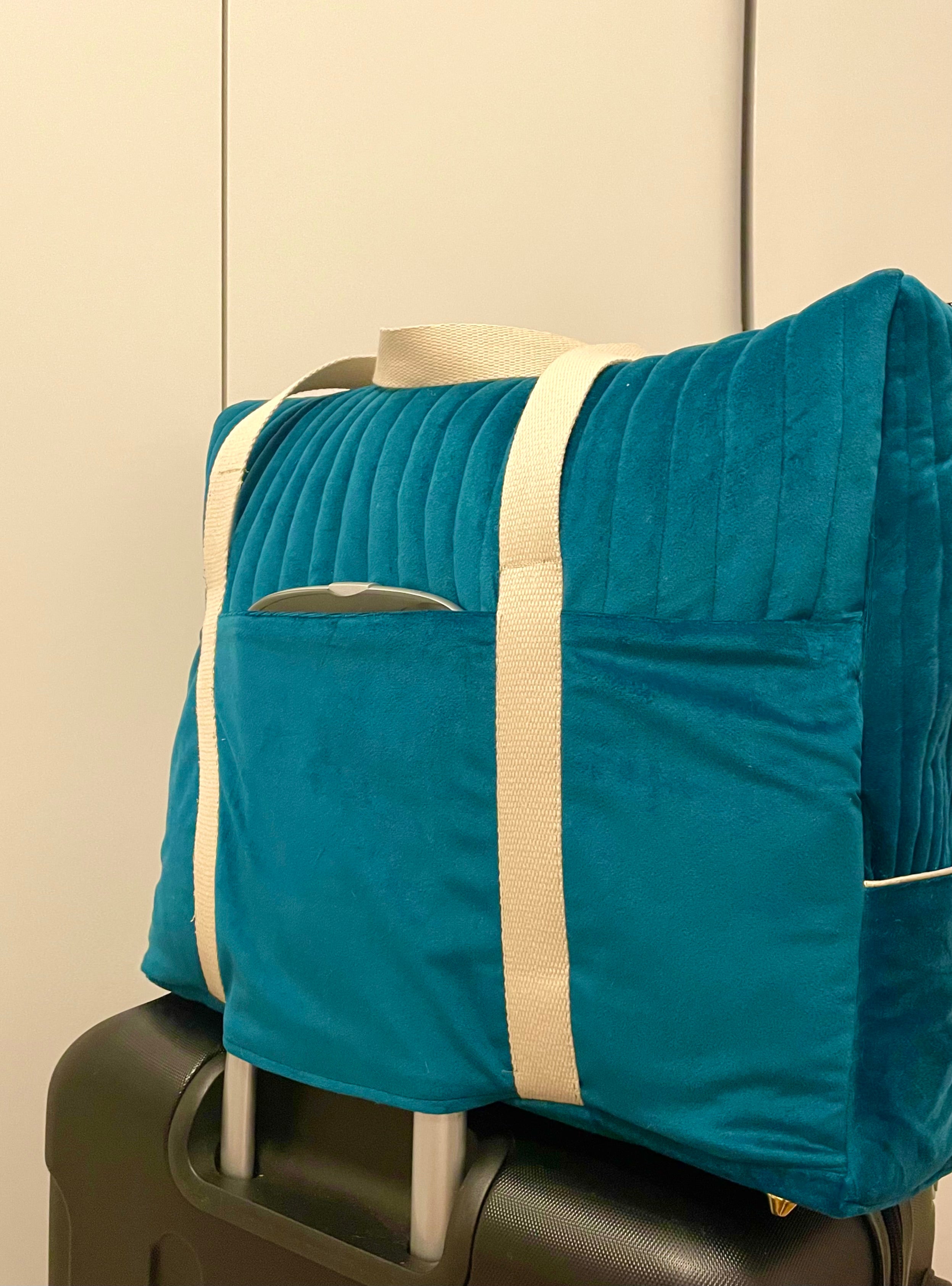 Le sac de voyage en velours vert