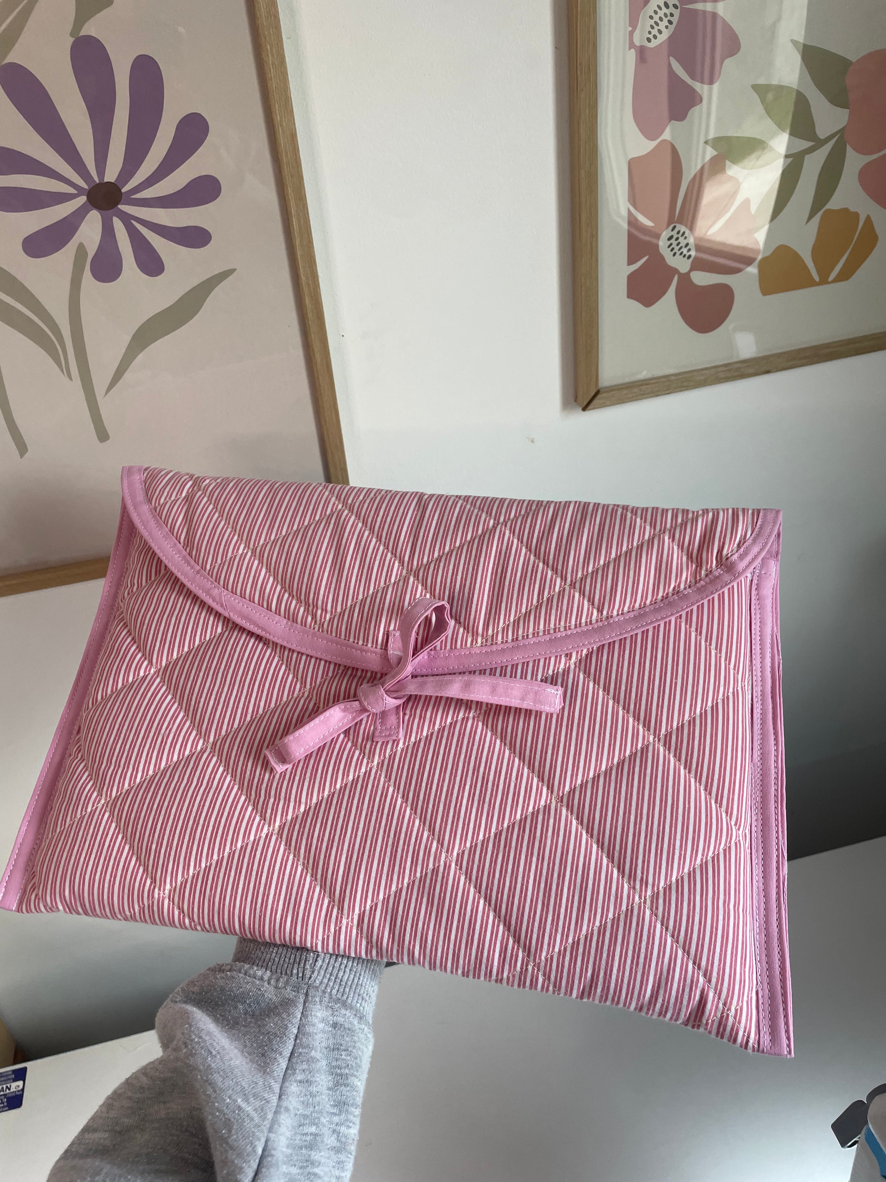 La housse d'ordinateur rose