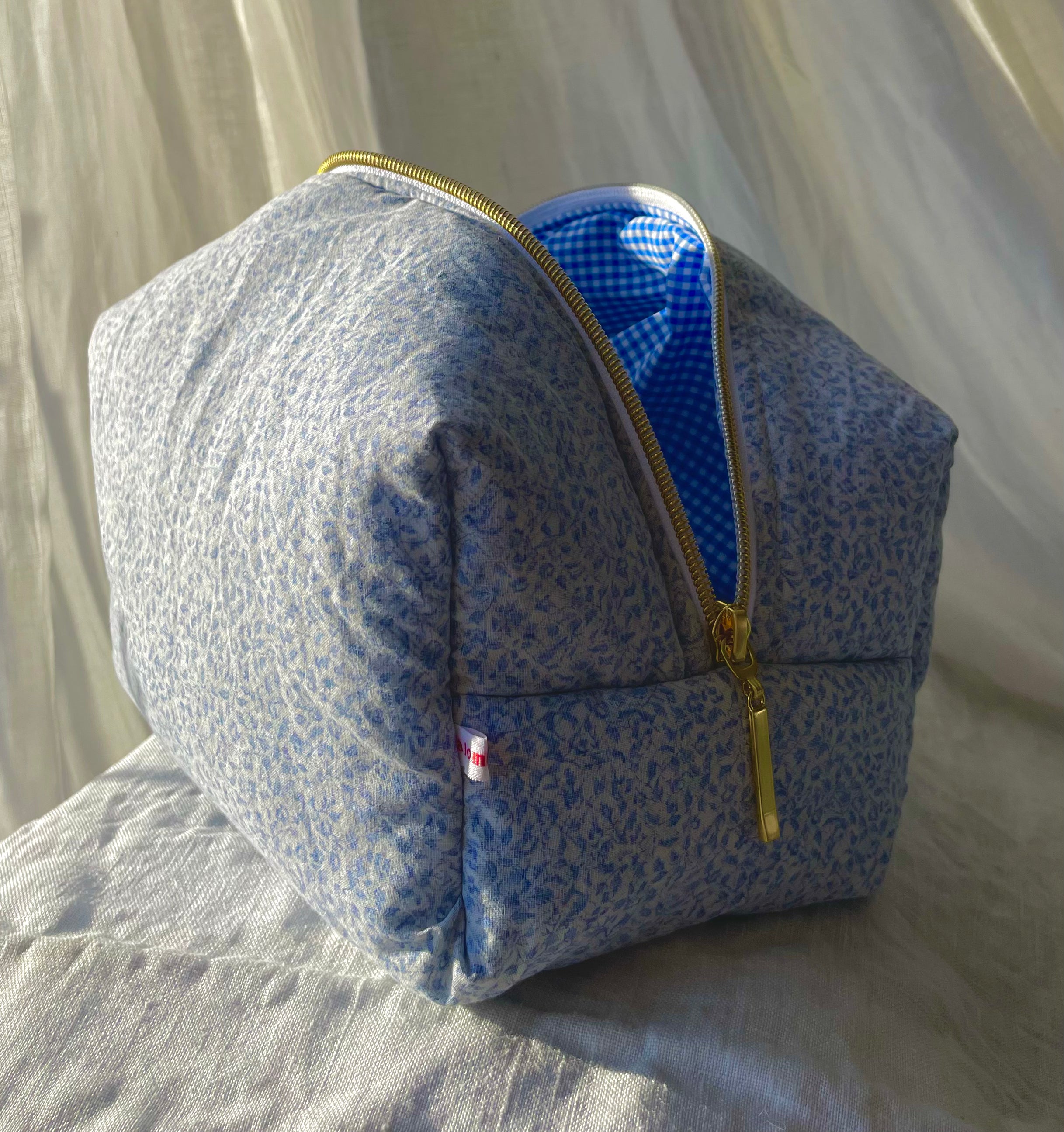 Trousse maquillage bleue fleuries